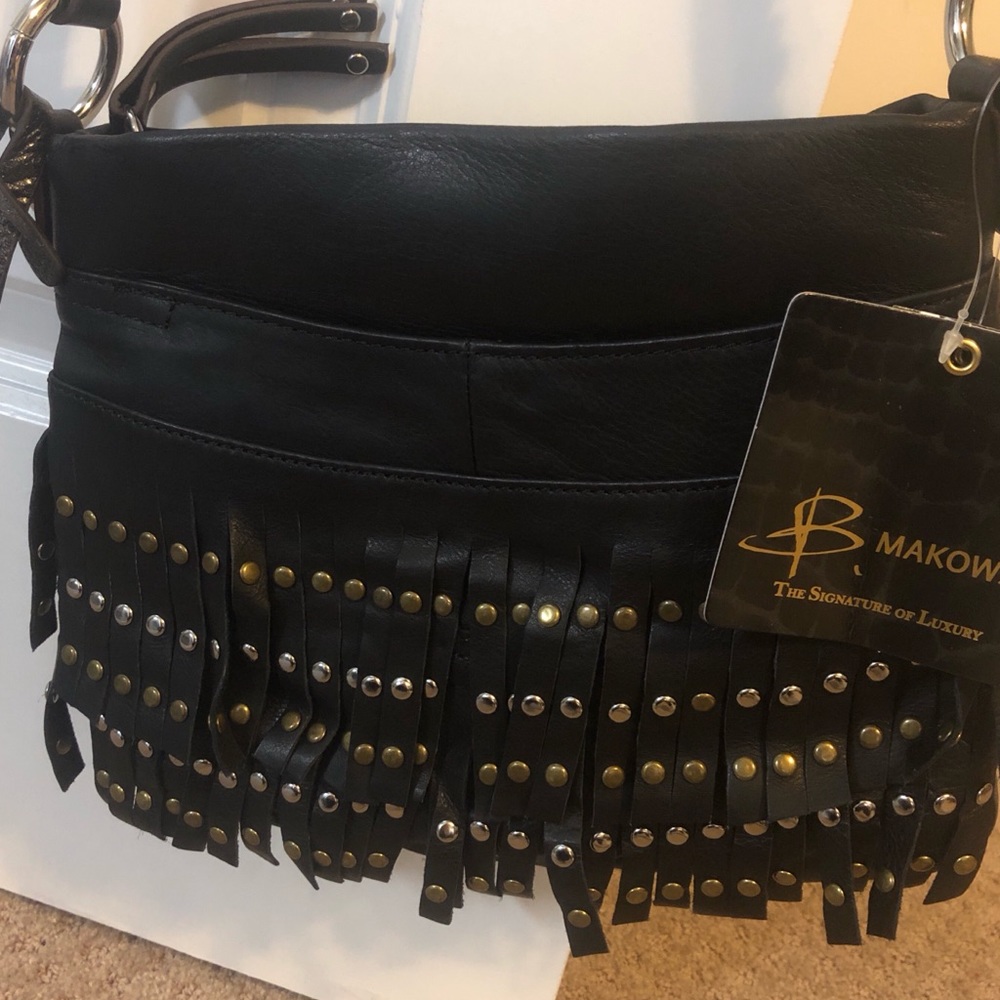 Black crossbody leather bag.